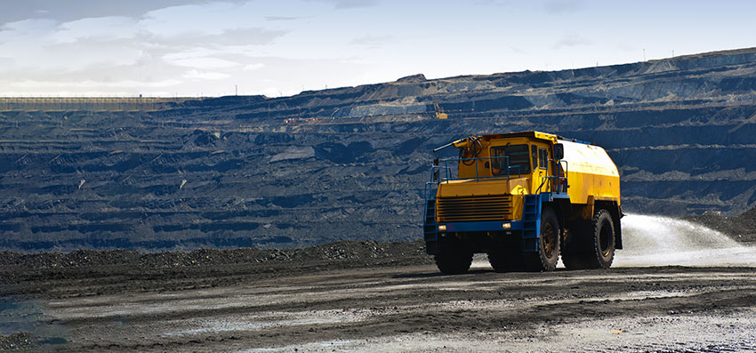 coal-mining-truck-spraying-dust-treatment